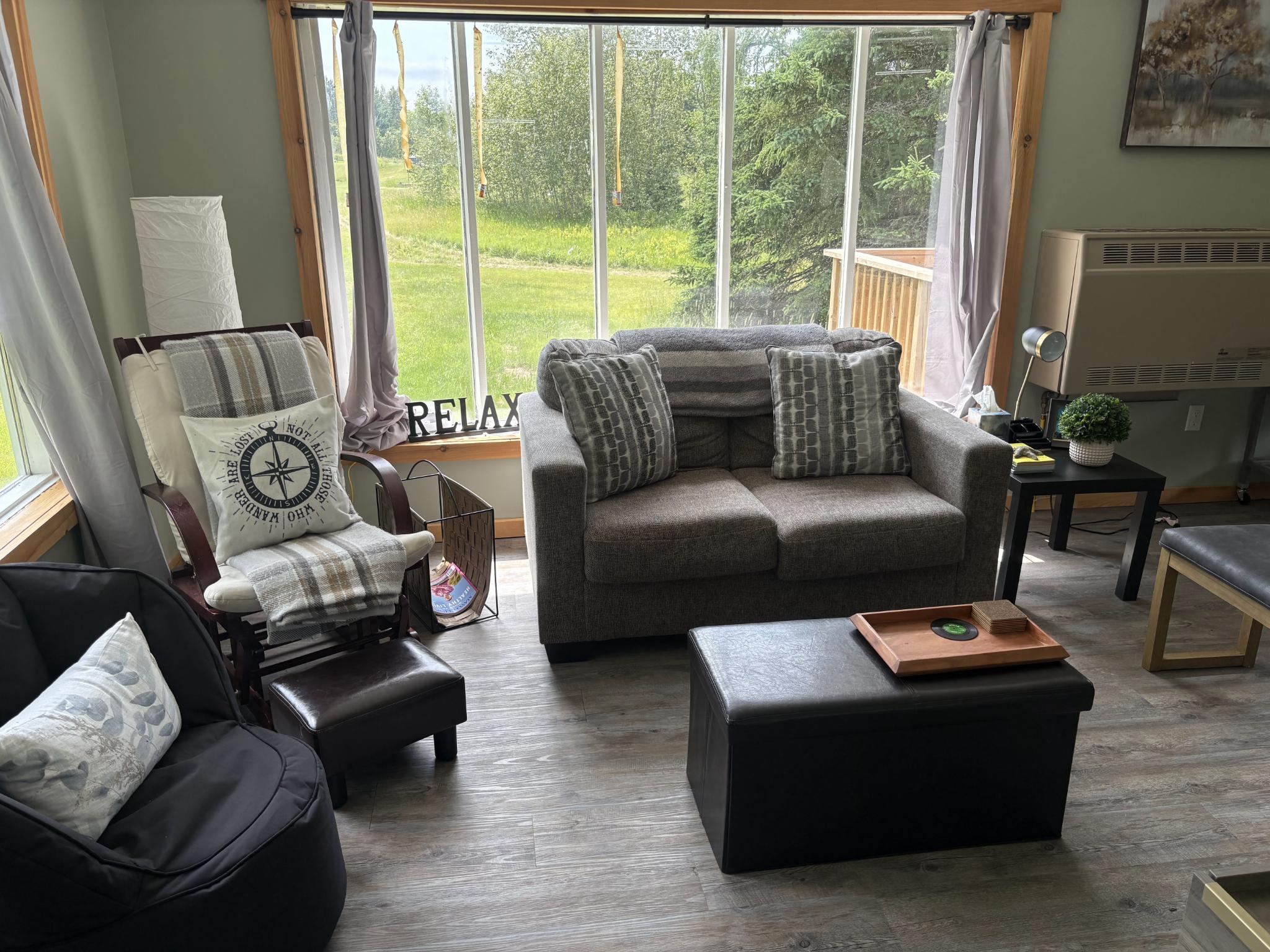 Living room with sofa and large picture window